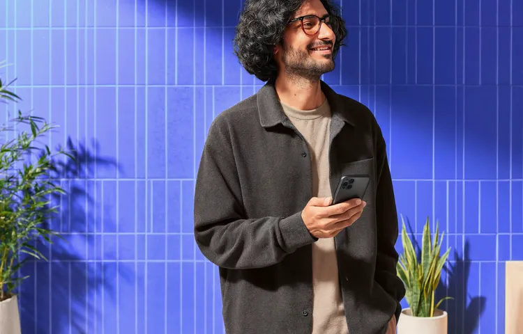 Person checking a cryptocurrency app on a smartphone