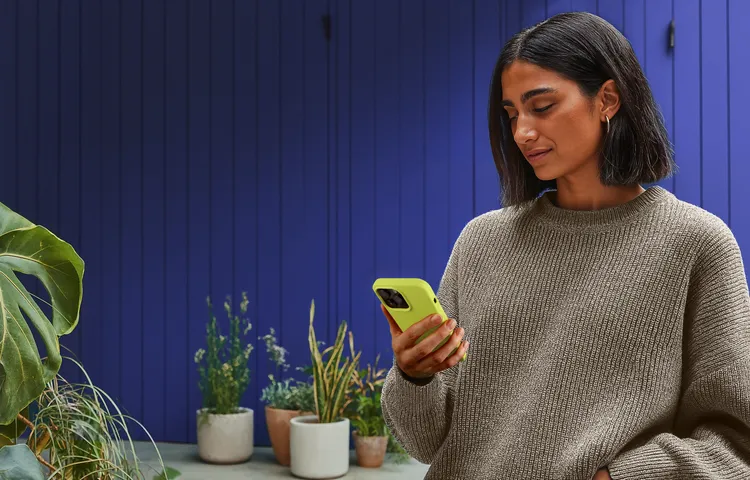 Person completing an identity verification on a smartphone
